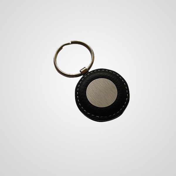 TA5-0020 Llavero de Cuero y Metal Circular Descripción: Llavero revestido